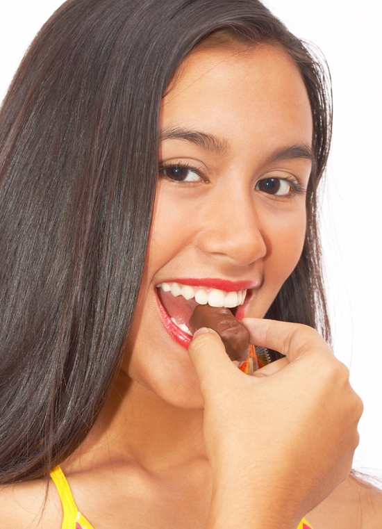 Girl Eating Some Chocolate